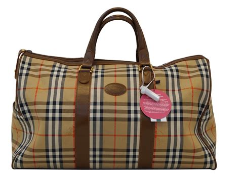 burberry travel bag with wheels|Burberry handbags latest collection.